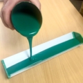 Pouring emulsion into a coater